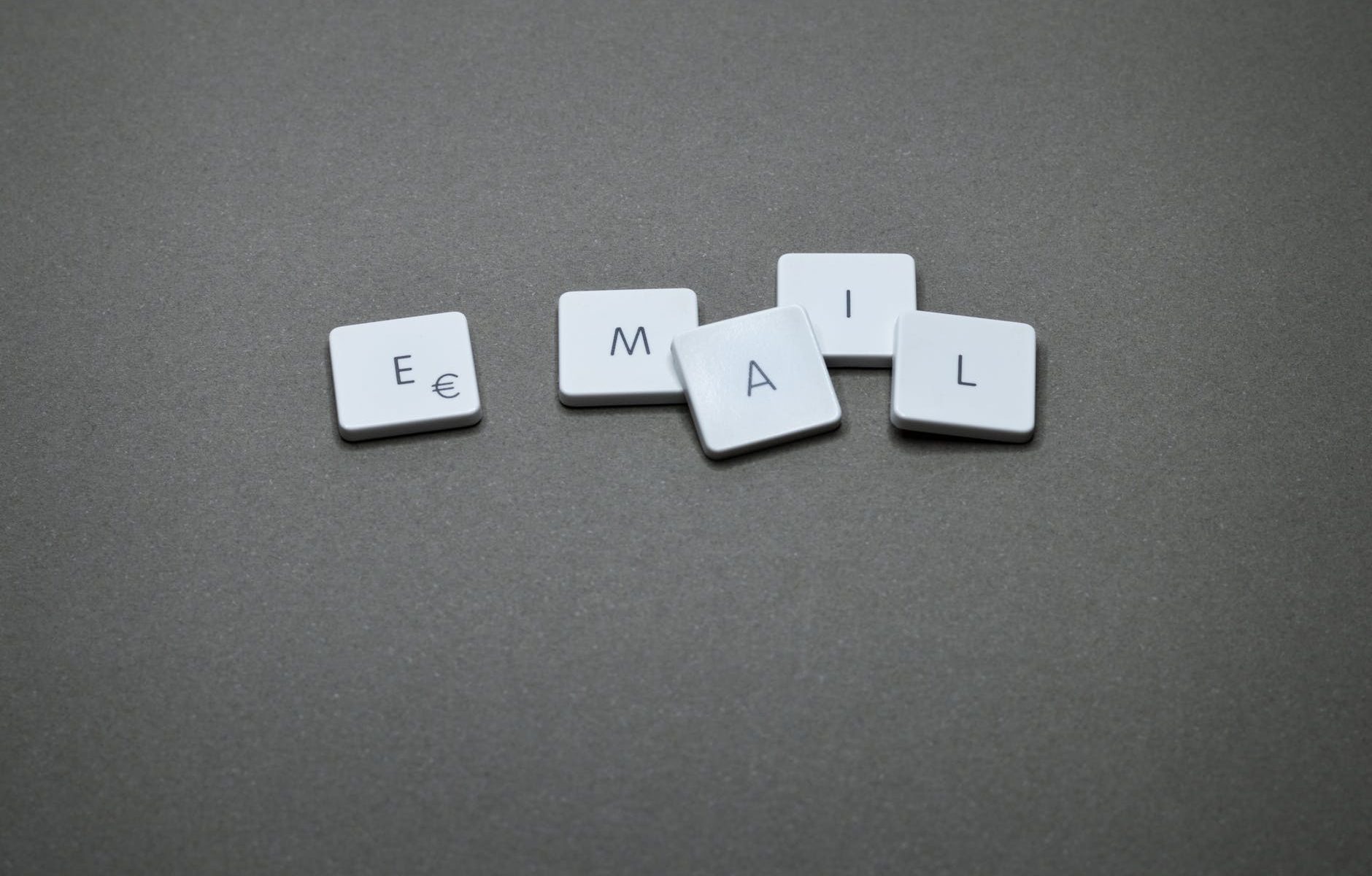email blocks on gray surface